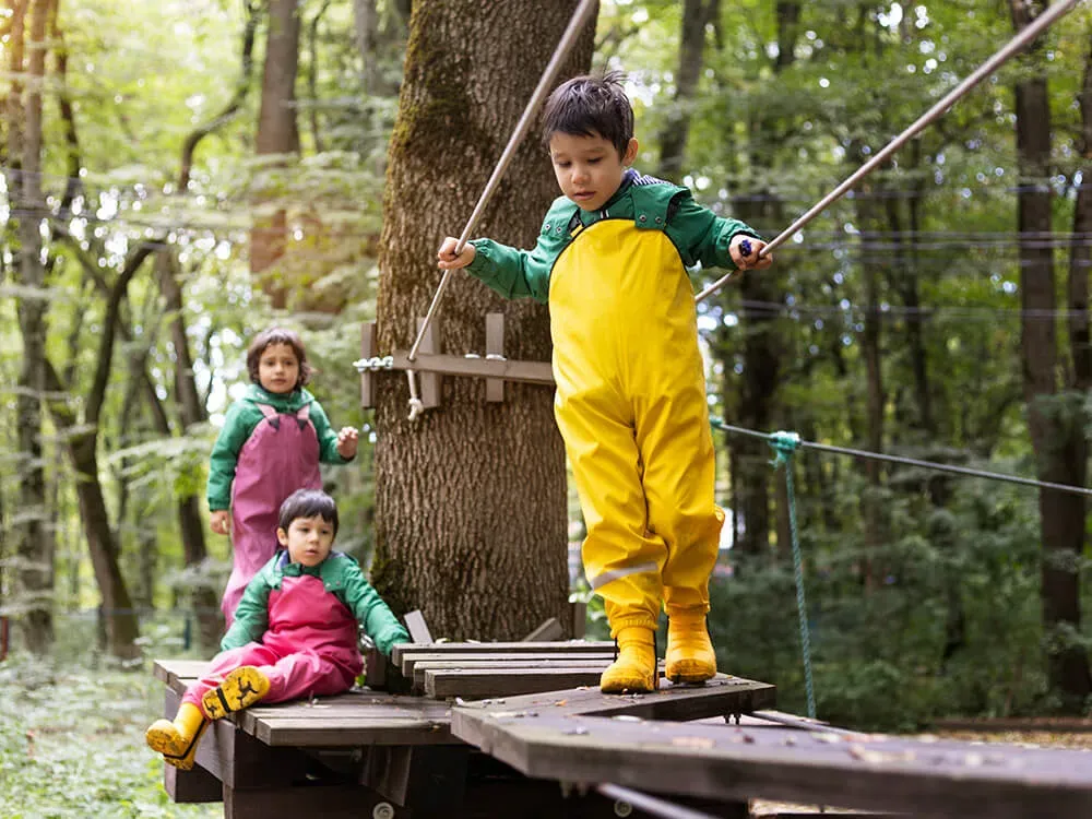 Camp staff preparing indoor backup activities for a rainy day at summer camp