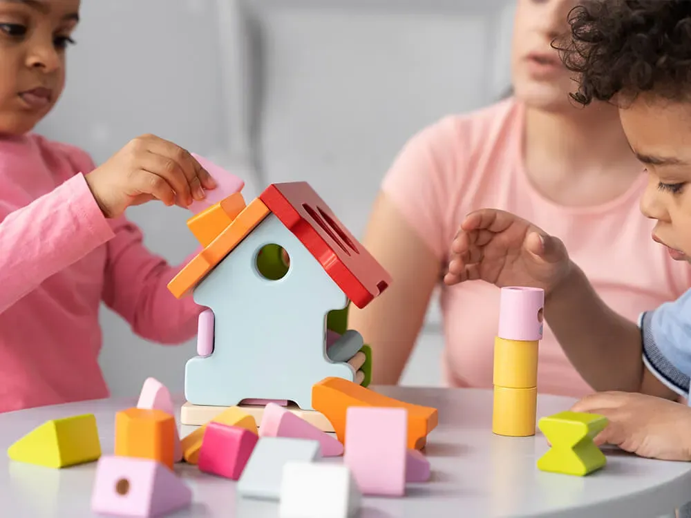 A daycare centre office desk with insurance documents and licensing paperwork