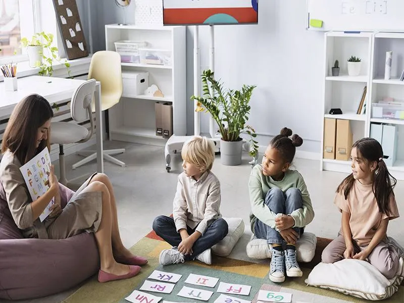 Children playing in a cozy home daycare setting with a family-like atmosphere