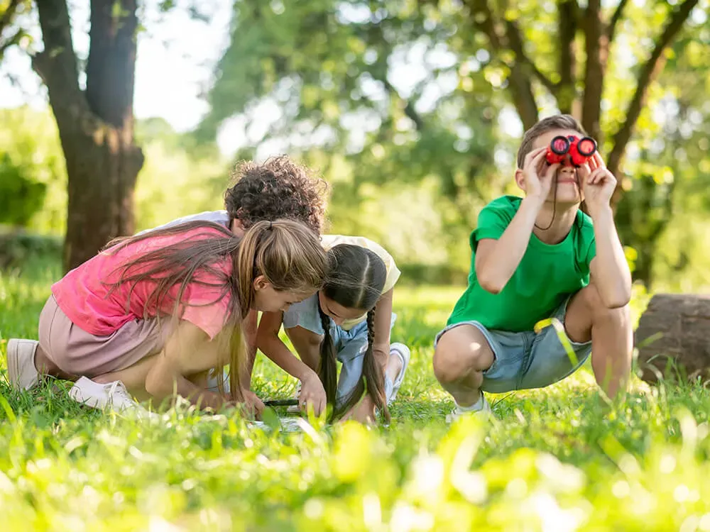 Children enjoying outdoor play daily as part of a nature-based childcare program