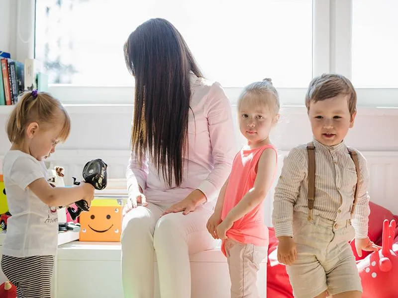Parent weighing the pros and cons of home daycare options