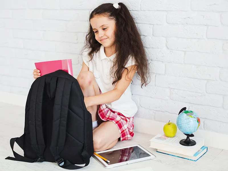 Child getting themselves up and ready for school independently