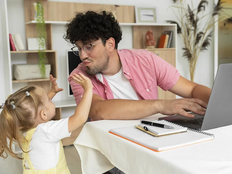establishing specific work hours and creating a clear division between work and family time