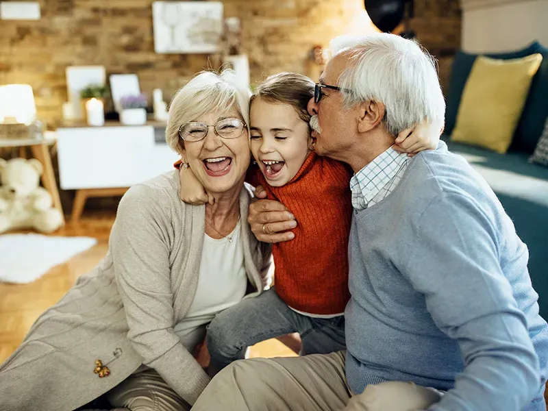 Grandparents bonding with grandchildren during babysitting