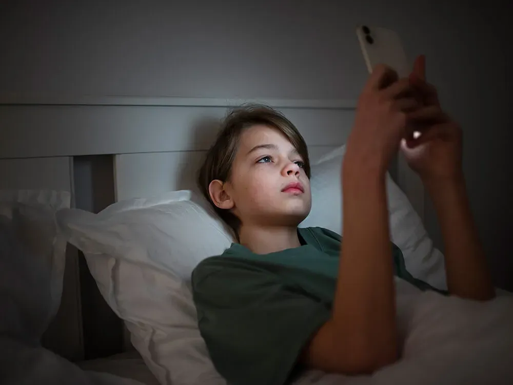 Sleep disruption from blue light exposure affecting melatonin production and causing daytime fatigue