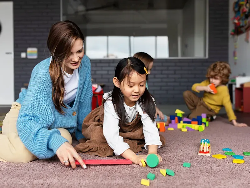 Children in a Canadian daycare benefiting from the affordable childcare program