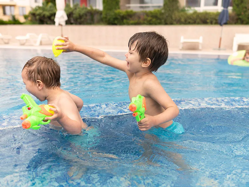Water play helps children develop both gross and fine motor skills