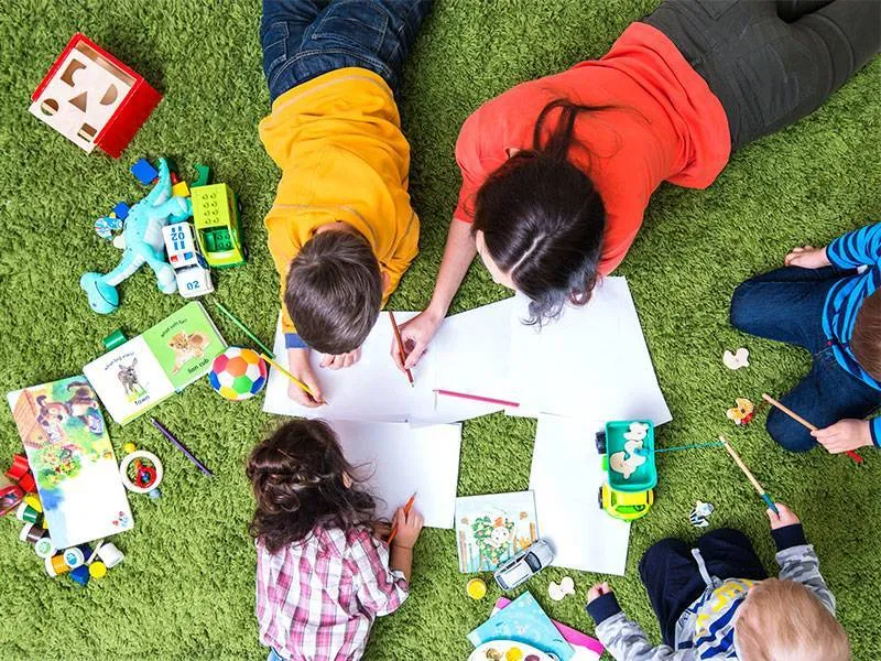 Interacting with and developing social skills in daycare center