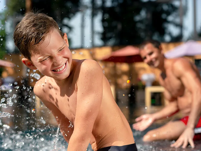 Water play activities offer a safe space for them to express their emotions