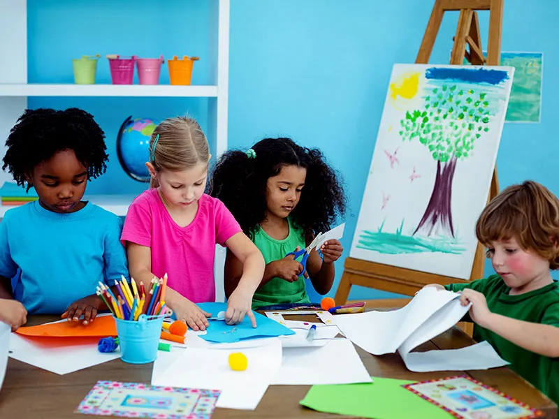Grow your child social skills by participating in group activities at preschool