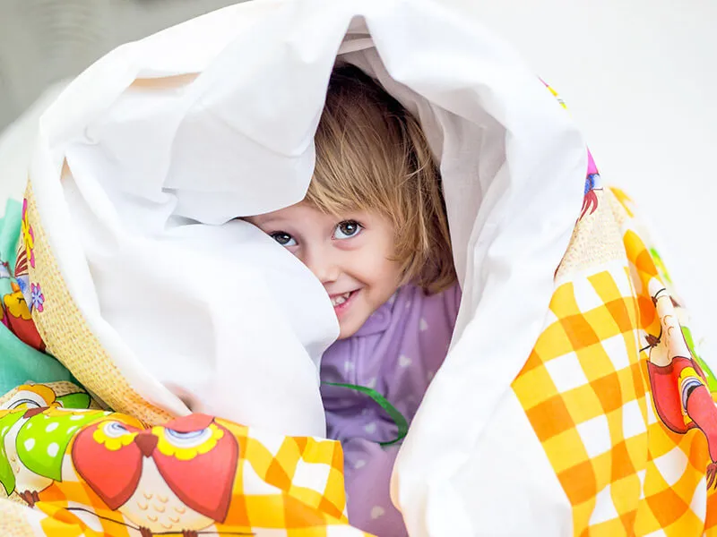 Bring along familiar objects from home, such as a favorite blanket or stuffed animal